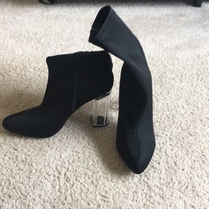 Black sock boots with clear heel
